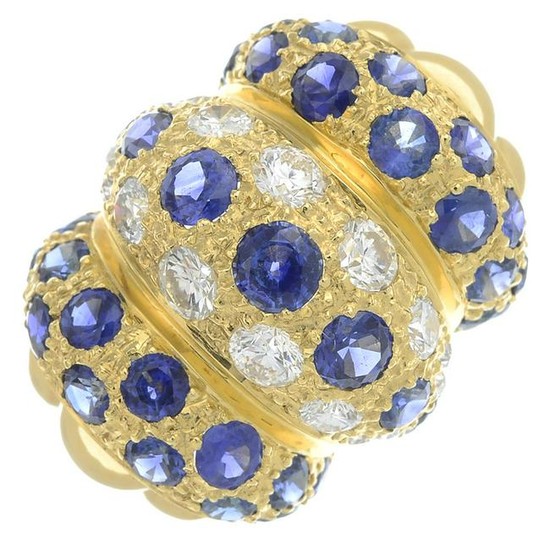 A sapphire and diamond dress ring.Estimated total