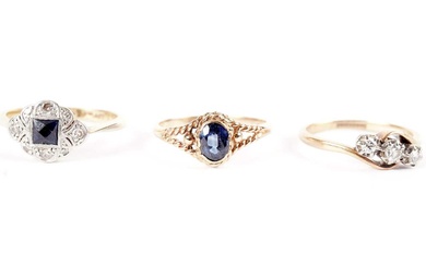 A sapphire and diamond ring; and two others
