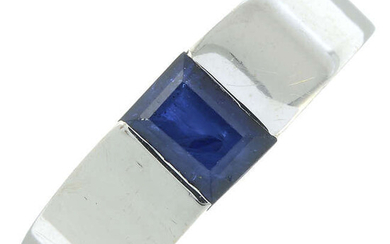 A sapphire single-stone band ring.