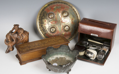 A selection of collectors' items, including an early 20th century leather cased vanity set, a C