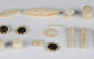 A selection of mainly 19th century bone and ivory needlework items, including a pin cushion clamp, c