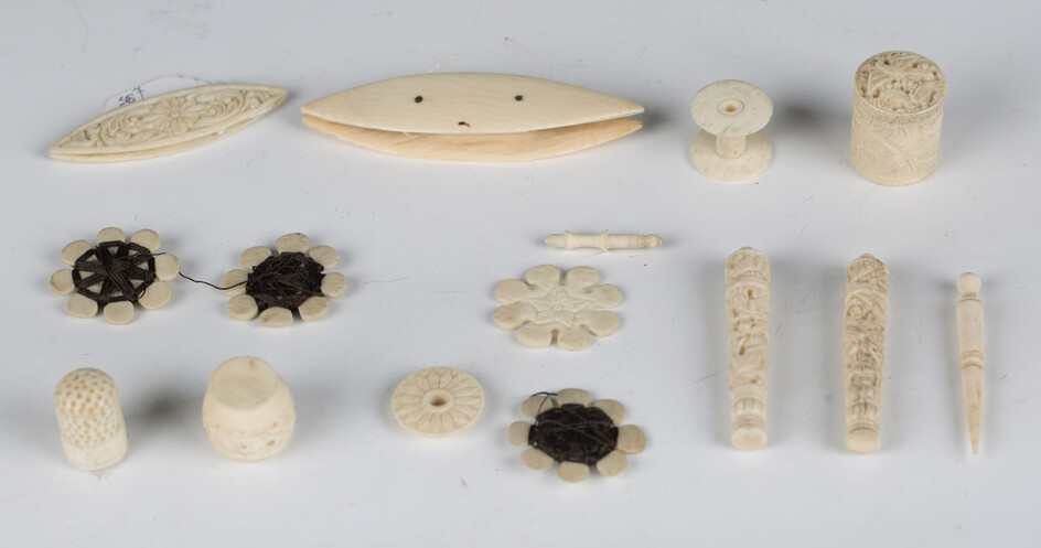 A selection of mainly 19th century bone and ivory needlework items, including a pin cushion clamp, c