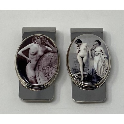 A silver and enamel money clip, decorated a nude, and anothe...