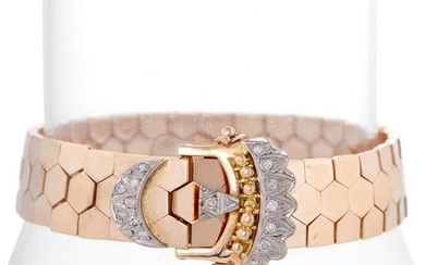 A tri-color fourteen karat gold and diamond bracelet