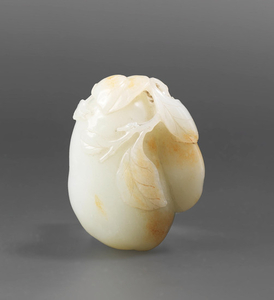 A white and russet jade carving of gourds