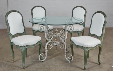 A wrought iron and glass center table