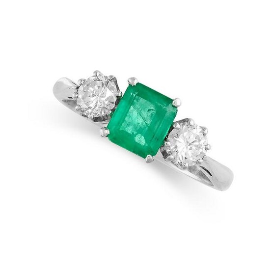 AN EMERALD AND DIAMOND THREE STONE RING in 18ct gold