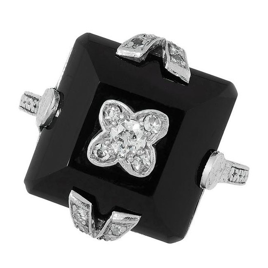 AN ONYX AND DIAMOND DRESS RING in Art Deco design