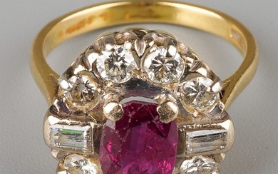 An 18ct yellow gold ruby and diamond cluster ring, set with ...