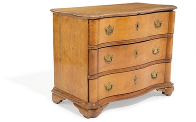 An 18th century oak Baroque chest of drawers, curved front with three drawers. H. 79. W. 105. D. 53 cm.