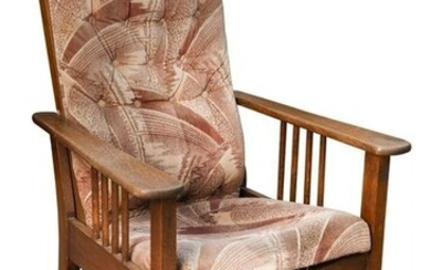 An Art Deco oak reclining armchair