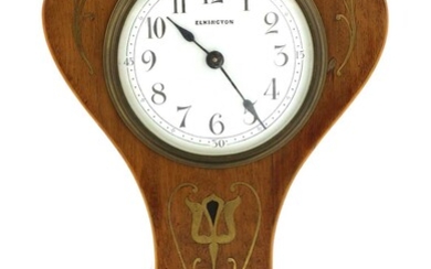 An Art Nouveau mahogany boxwood and brass-inlaid mantel clock