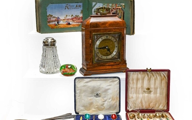 An Elliot mantel timepiece in a burr walnut case,...