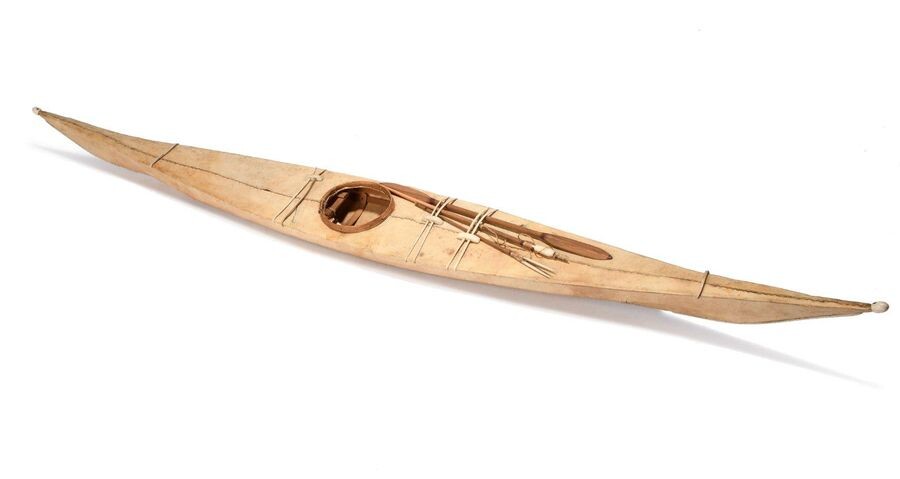 Inuit model kayak. Greenland. wood frame with sealskin and marine ivory mounts, with an