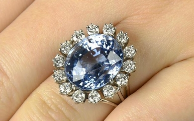 An aquamarine and diamond cluster ring.Aquamarine