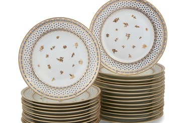 An assembled suite of Limoges dinnerware