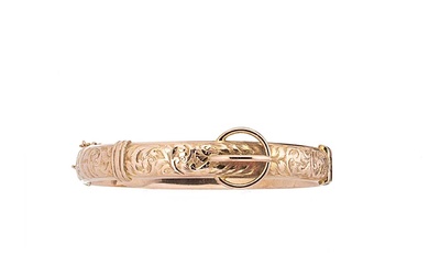 An early 20th century 9ct gold buckle style bangle