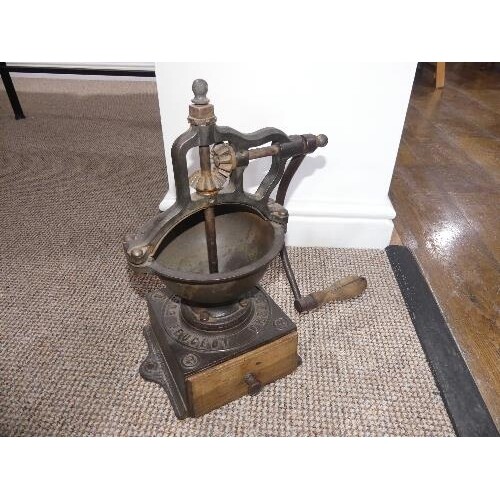 An early 20thC cast iron Coffee Grinder, by Peugeot Freres (...
