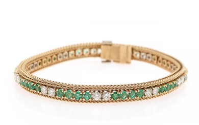An emerald and diamond bracelet set with numerous circular-cut emeralds and brilliant-cut diamonds, mounted in 18k gold. Circa 1950–1960. L. 18.5 cm.