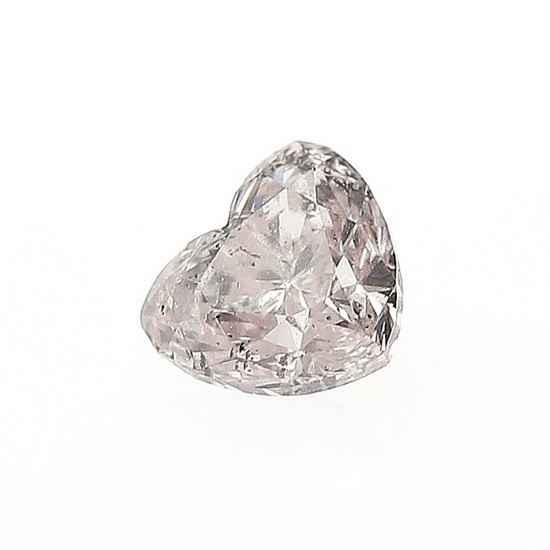 An unmounted heart-shaped diamond weighing 0.33 ct. Colour Natural Light Pink.