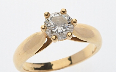 BAGUE "Solitaire" en or jaune 750/°° sertie d'un diamant de taille brillant de 0.95 ct...