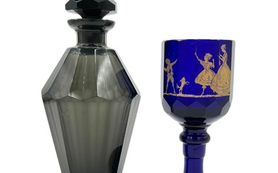 BLACK BOHEMIAN GLASS VASE AND BLUE GOBLET Featuring a...