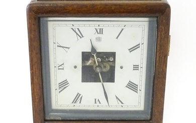 Bulle : A French Art Deco oak cased electric mantel clock by Bulle. The dial signed Bulle Patent
