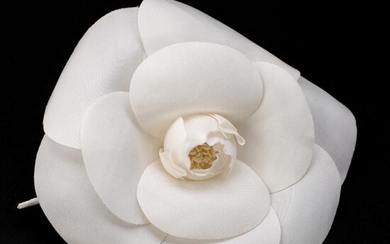 SOLD. Chanel: A white brooch of fabric in the shape of a flower. Diam. app. 12 cm. – Bruun Rasmussen Auctioneers of Fine Art