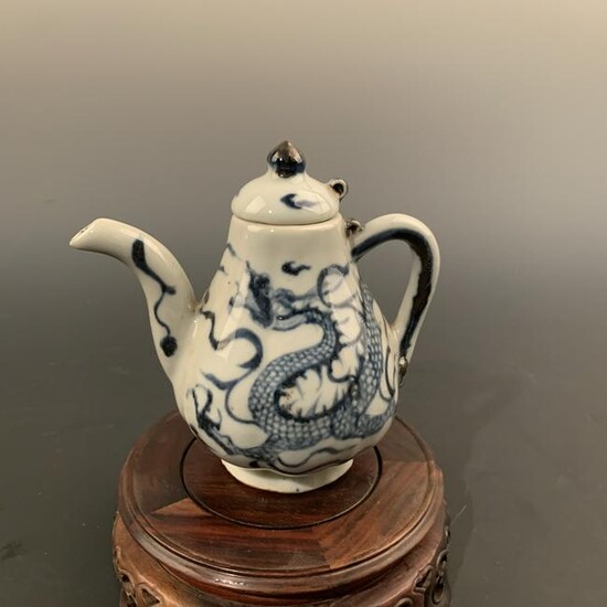Chinese Yun Dynasty Blue and White Dragon Holding a Pot