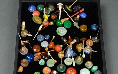 Collection of Chinese snuff bottle stoppers and spoons