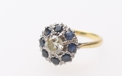 Diamond and sapphire cluster ring, centred with an old cut r...