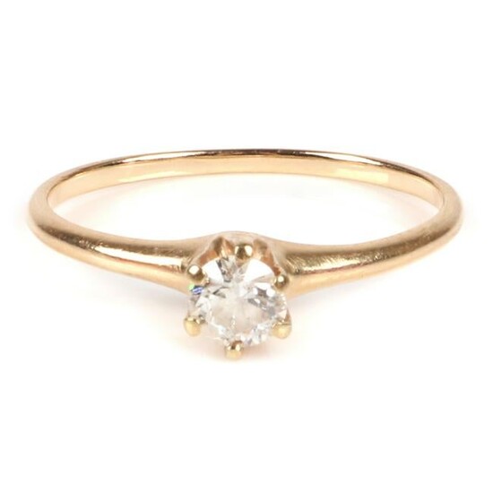 Diamond solitaire 14K yellow gold engagement ring.