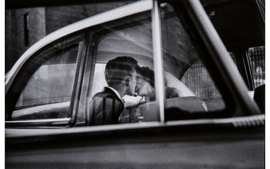 Elliott Erwitt (b. 1928), New York (Couple Kissing in Back of Car) (1953)