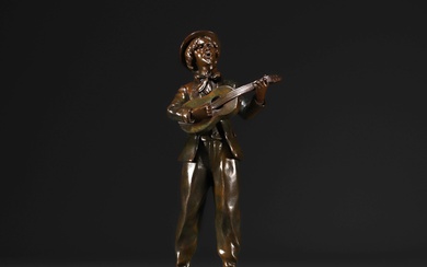 Eugène WATRIN - "Jeune garçon à la guitare" Sculpture en bronze. Signé sur la base....