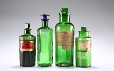 FOUR LATE VICTORIAN GREEN GLASS APOTHECARY BOTTLES