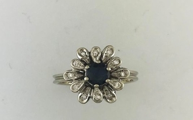 Flower ring in white gold 750°/°°° set with...