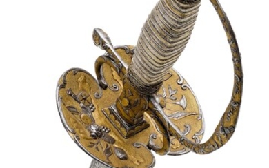 GALADEGENFrançais, vers 1750, pour un officier. Poignée en fer, composée de pièces moulées et forgées,...
