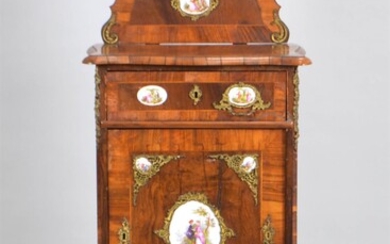 GERMAN ROCOCO STYLE PORCELAIN AND GILT METAL MOUNTED WALNUT CABINET