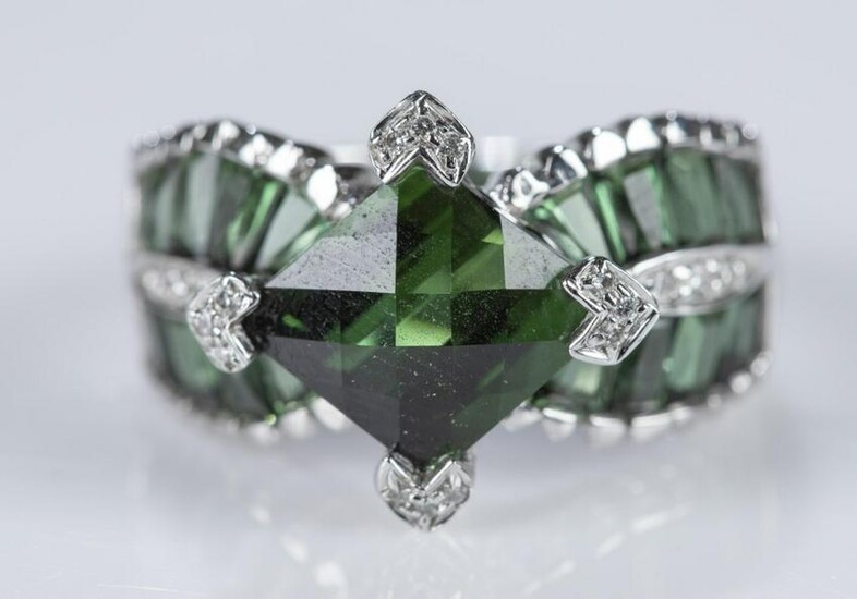 Green tourmaline, diamond, and 18k gold ring.