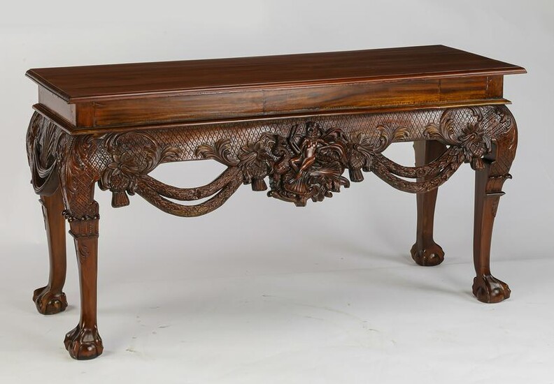 Highly carved mahogany console, 59"w