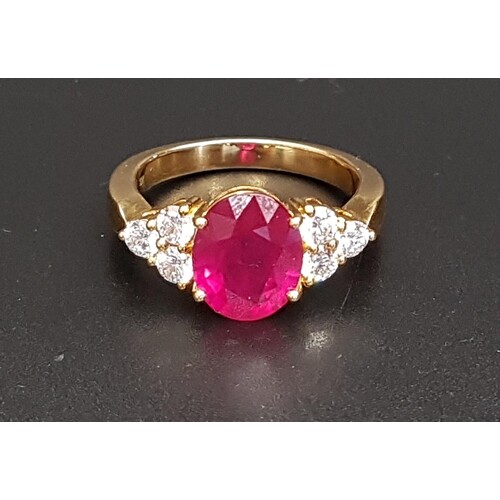 IMPRESSIVE RUBY AND DIAMOND RING the large central oval cut ...