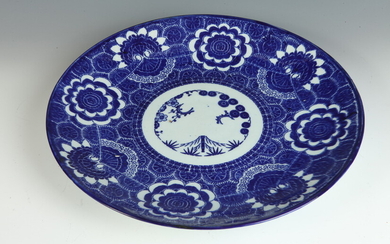 JAPANESE BLUE AND WHITE PORCELAIN CHARGER DECORATED WITH LARGE FLORAL...