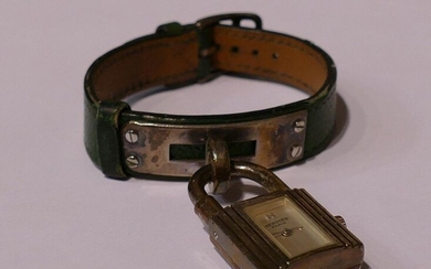 Baume et Mercier steel watch, Kelly model. Green leather strap....