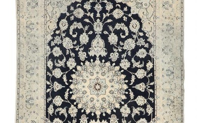 Nain rug with silk, Persia. Medallion design with ornaments, flowers and foliage...