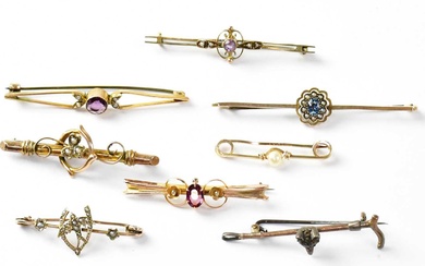 Nine bar brooches comprising six 9ct gold examples set with...