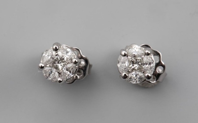 Pair of 18k white gold "Illusion" round earrings...