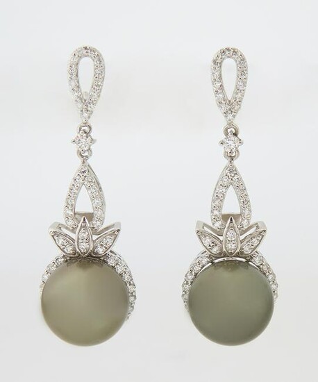 Pair of Platinum Pendant Earrings, each with a pierced