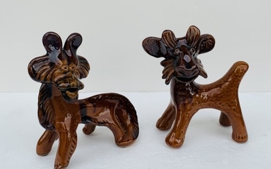 Pair of Stylized ceramic Lions