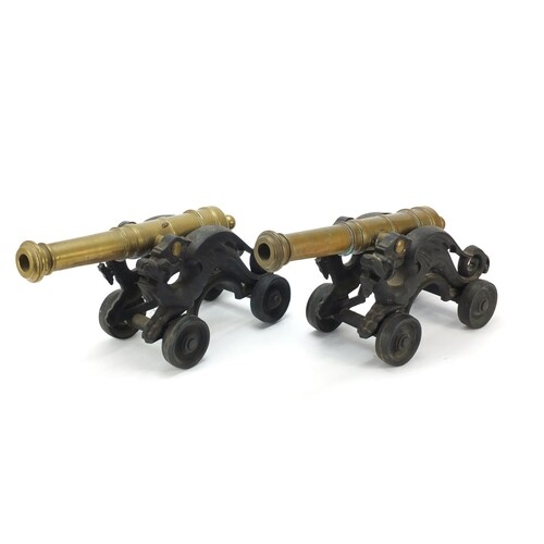 Pair of early 20th century bronze and cast iron cannons, eac...