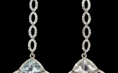 Pair of silver and gold aquamarine and round brilliant cut diamond openwork pendant stud earrings
